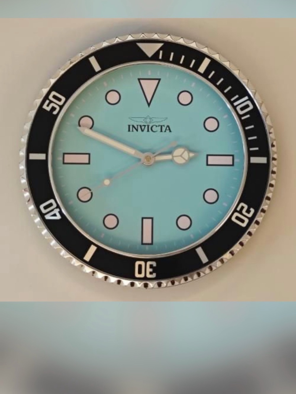 Invicta Wall Clock in Turquoise and Black Accent